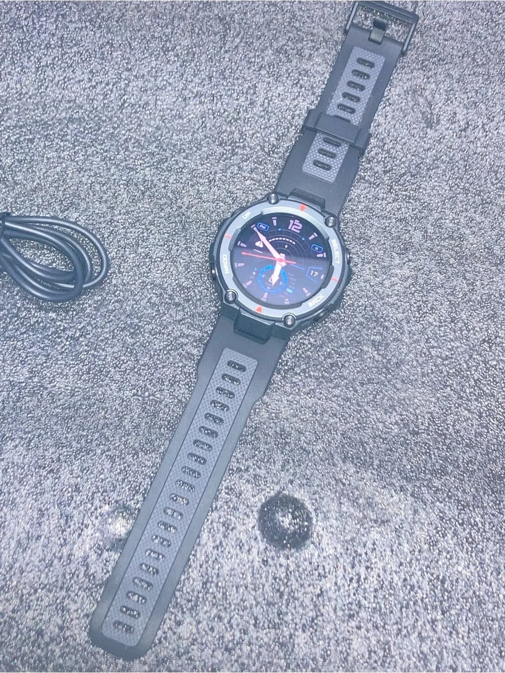 Rugged Black Smartwatch with Pink-Accented Dial